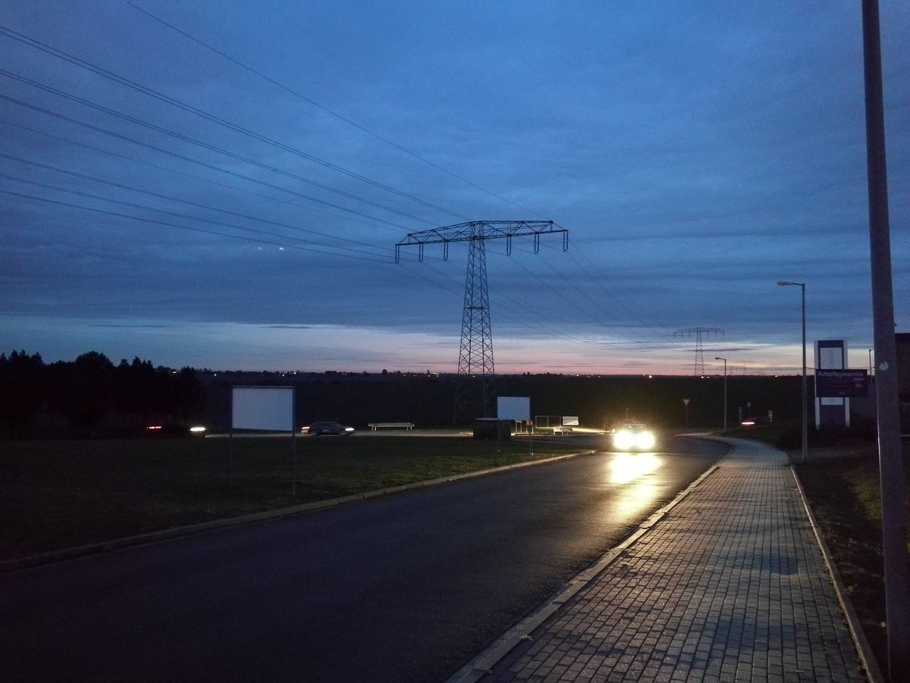 ROAD AGAINST SKY AT NIGHT