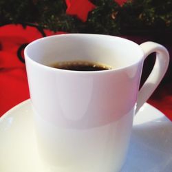 Close-up of coffee cup on table