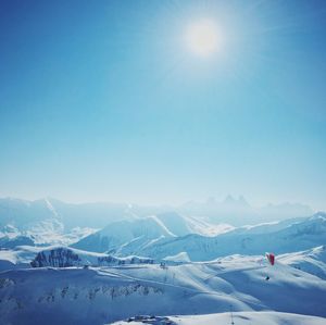 Scenic view of snow covered mountains