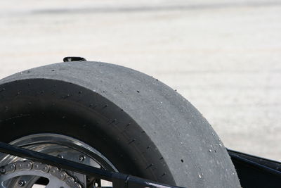 Close-up of tire in water