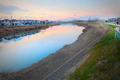 View of harbor at sunset