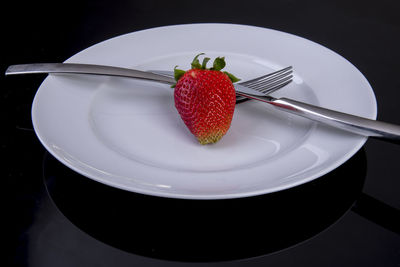 Close-up of strawberries in plate