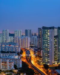 High angle view of illuminated buildings against sky