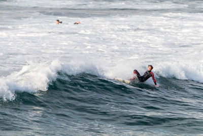 Man surfing in sea