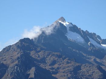 Scenic view of snow covered mountains