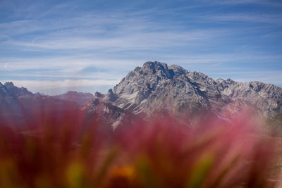 Scenic view of snowcapped mountains against sky