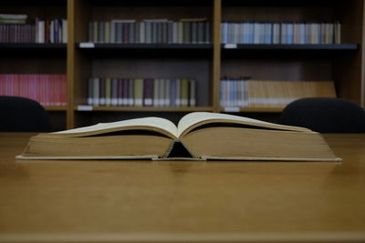 Close-up of open book on table