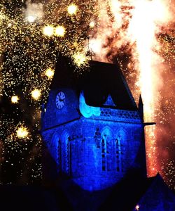 Low angle view of illuminated built structure