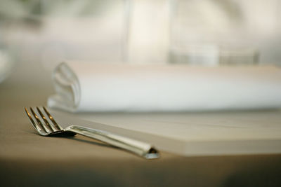 Close-up of empty drinking glasses on table
