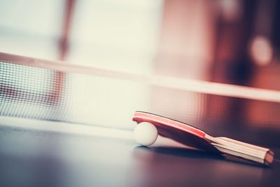 Close-up of table tennis ball and racket