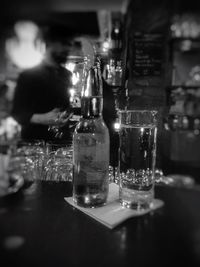 Close-up of wine bottles on table