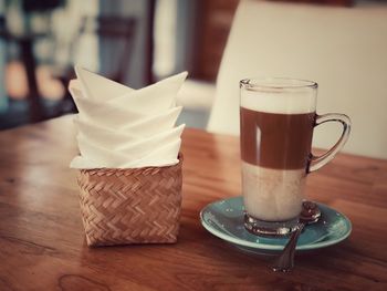 Close-up of coffee cup on table