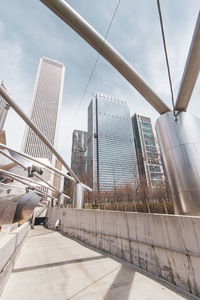 Low angle view of modern buildings against sky
