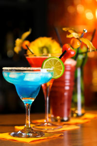 Close-up of drinks and fruits in glass