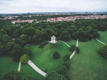 High angle view of green landscape against sky