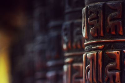 Close-up of candles in temple