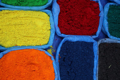 High angle view of various powder paints at market