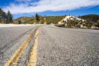 Surface level of road against sky