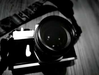 Close-up of camera on table