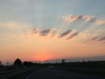 Road against sky during sunset