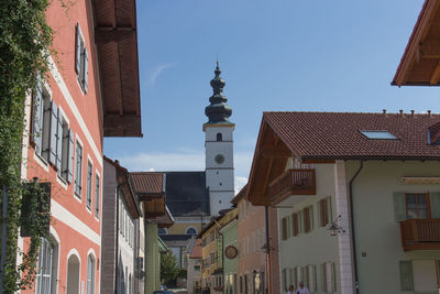 Houses in town against sky