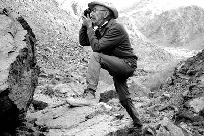 Man standing on rock