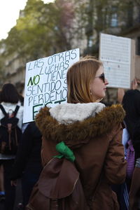 Woman standing with text