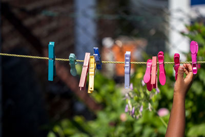 Close-up of clothespines on clothesline