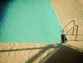 High angle view of swimming pool by sea