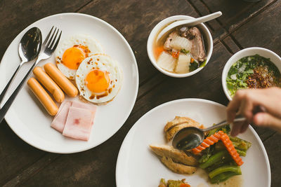 High angle view of breakfast served on table