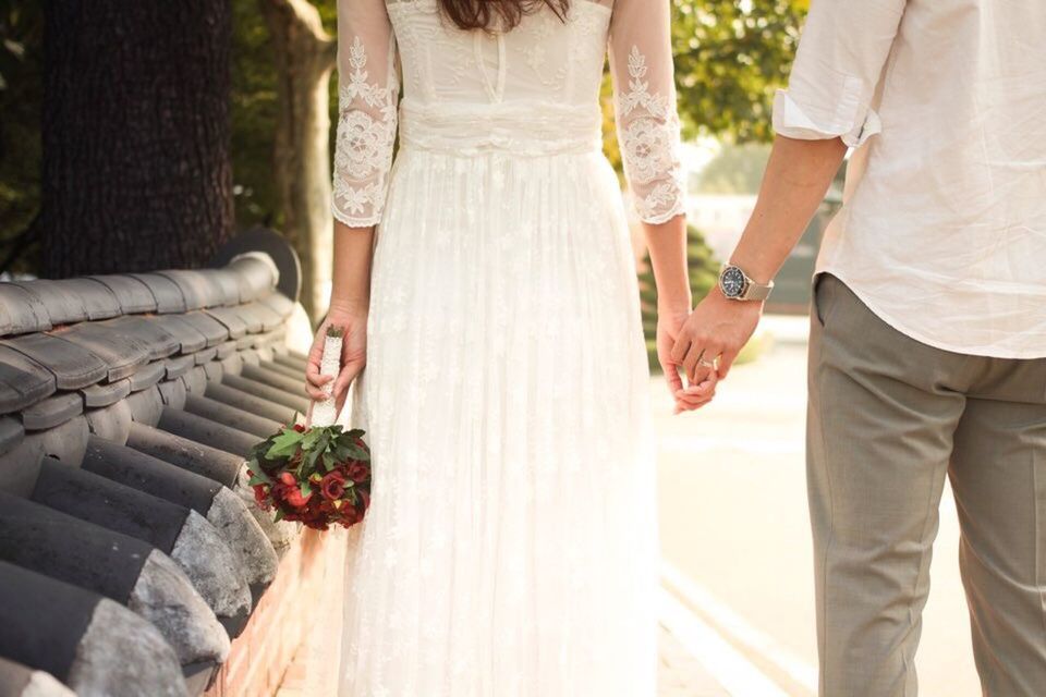 togetherness, two people, midsection, women, holding, people, adult, outdoors, tree, bouquet, nature, wedding dress, day, human hand, unity, adults only