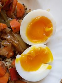 High angle view of eggs and vegetables in a plate