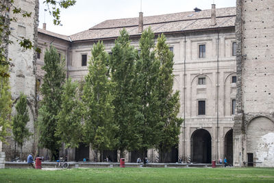 Trees in front of historic building