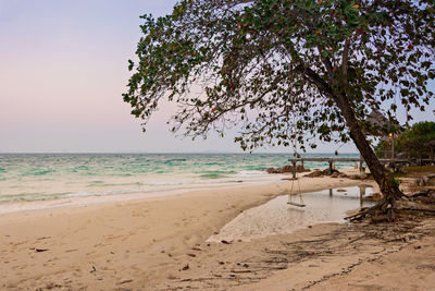 View of beach against clear sky