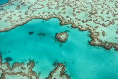 High angle view of blue sea shore