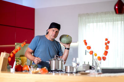 Man preparing food on table at home