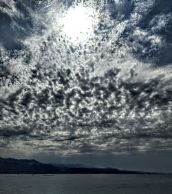 Low angle view of dramatic sky over sea