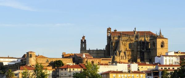 Low angle view of buildings against sky in city