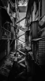 Staircase amidst residential buildings in city