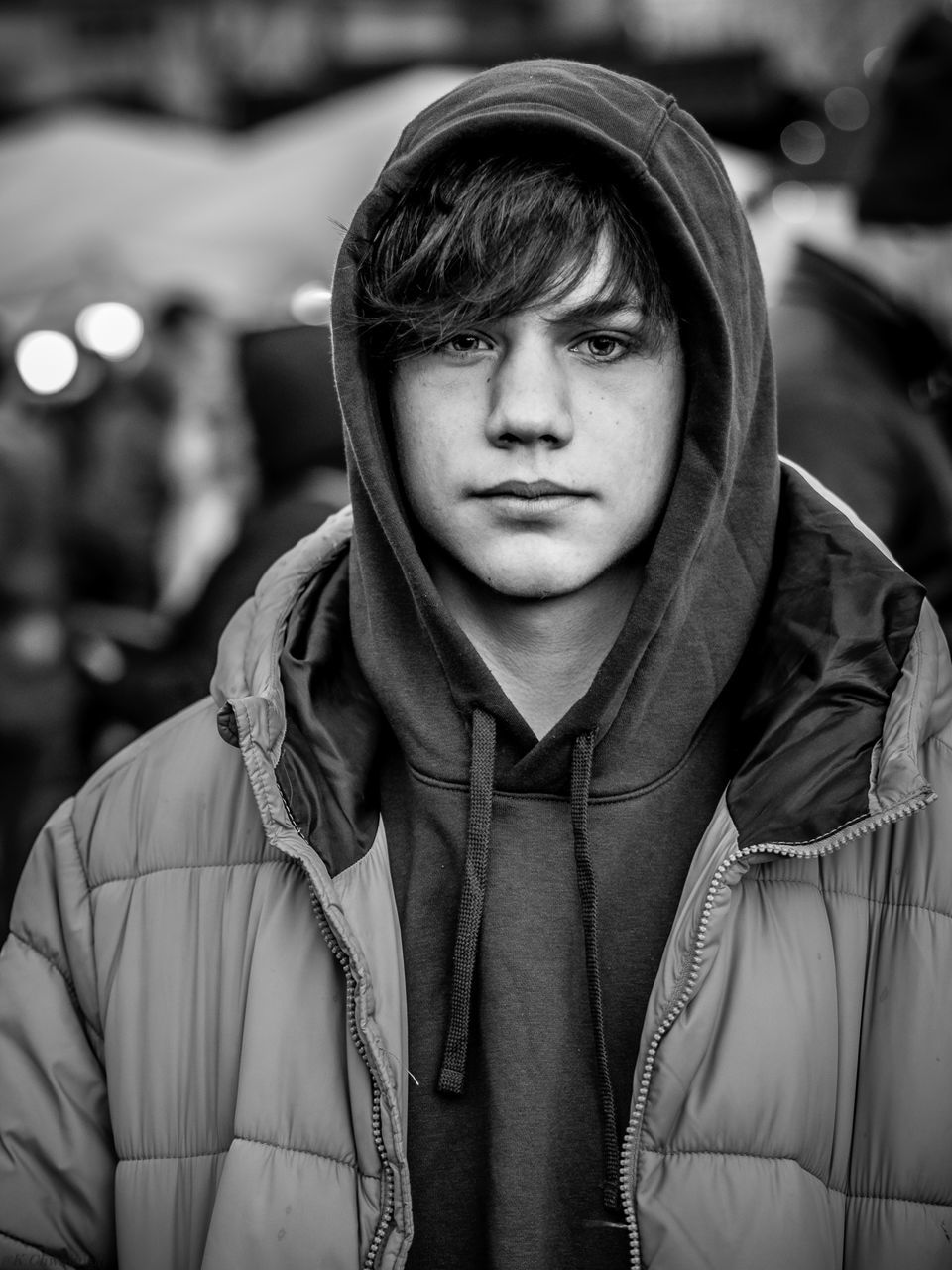 portrait, clothing, hood, one person, front view, headshot, hood - clothing, lifestyles, real people, focus on foreground, hooded shirt, looking at camera, young adult, leisure activity, jacket, winter, standing, young men, warm clothing, scarf