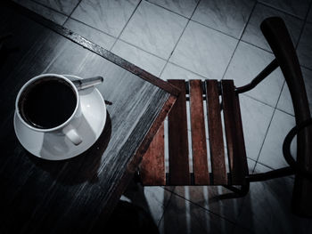 High angle view of coffee cup on table