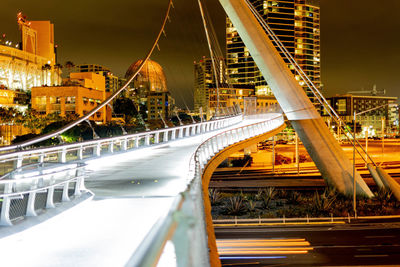 View of bridge in city at night