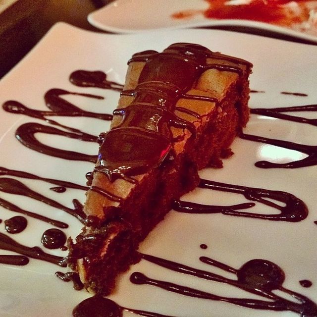 indoors, still life, table, close-up, sweet food, food and drink, food, high angle view, chocolate, dessert, plate, indulgence, no people, cake, fork, ready-to-eat, brown, unhealthy eating, wood - material, freshness