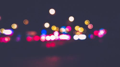 Defocused image of colorful lights at night