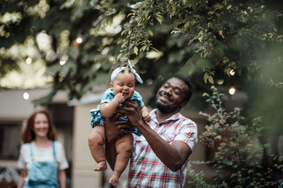 Full length of father with daughter