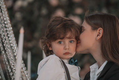 Portrait of mother and daughter outdoors