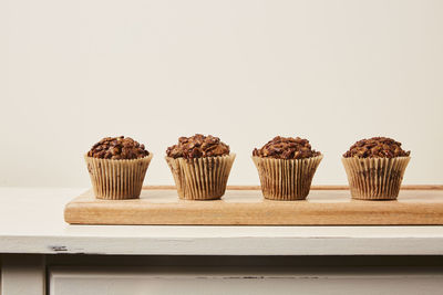 Close-up of cupcakes against white background