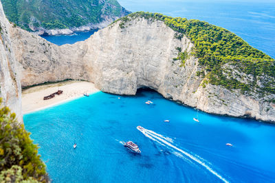 High angle view of boats on sea shore