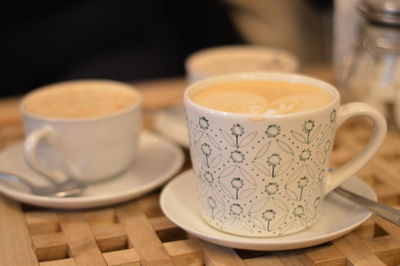 Close-up of coffee cup on table