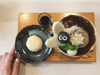 Close-up of hand holding coffee